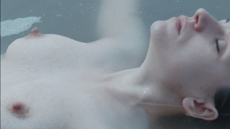 Shian Denovan Nude in Siren. Breasts, Skinny Dipping, floating in water on back. 810610