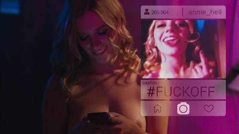 Nudes of Jessika from Exposed. Breasts, looking at phone, middle finger. 819120
