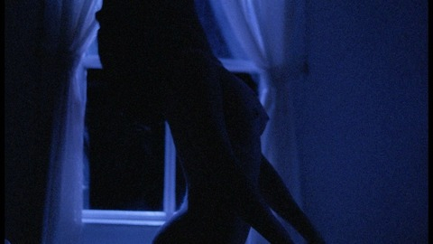Sarah from Blood Beat Naked. Breasts, arched back, blue lighting. 821825