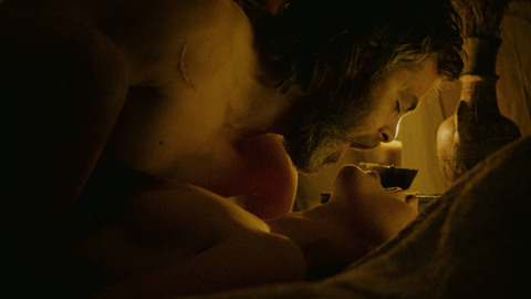 Elizabeth Burgh from Outlaw King Naked. Breasts, arched back, candle light. 843827