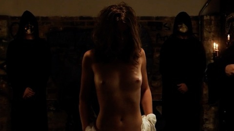 Meredith Carr from The Demonologist Naked. Breasts, brunette, candles. 853769