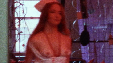 Alley Ninestein Naked as Nurse. Breasts, axe, blood. 866925
