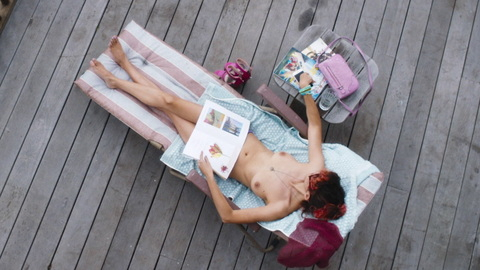 Audrey Tautou Naked as Marie. Breasts, laying down, legs crossed. 900465