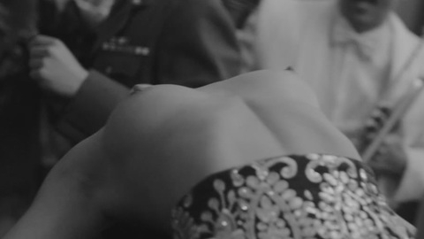Lucia Muzo Naked as Chica topless. Breasts, arched back, black and white. 906591