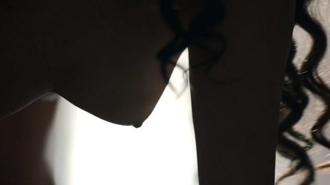 Amina from El Cid Naked. Breasts, brunette, curly hair. 930911