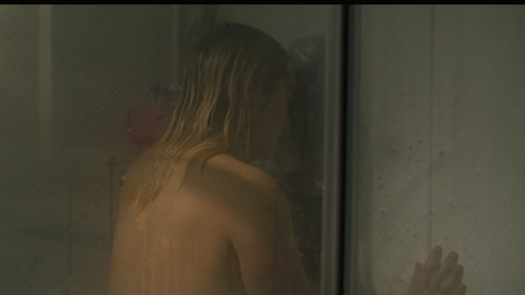 Sexiest Scenes of Marianne 'Mare' Sheehan from Mare of Easttown. Sexy, bare back, glass door. 944441