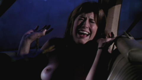Girl at Drive-in Theatre (uncredited) from The Being Naked. Breasts, car, night. 946367
