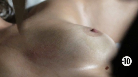 Delphine Maisonneuve from Dead Beautiful Naked. Breasts, in bed, knife. 951125