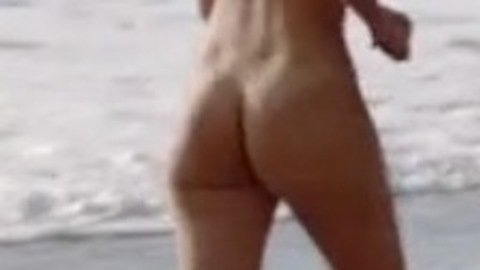 Beatrice Bartoni Naked as N/A. Butt, beach, group nudity. 958365