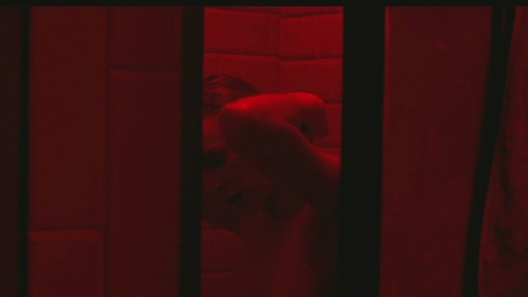 Nudes of Laura from The Bunker Game. Breasts, hard nipples, red lighting. 972108