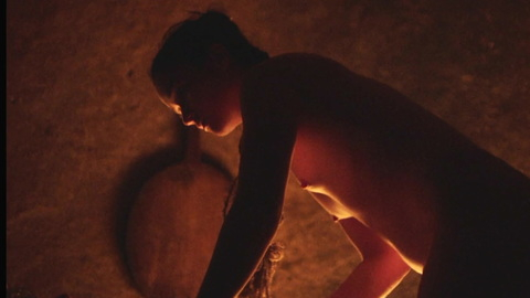 Alice Englert Naked as Biliana. Breasts, dark room, fire. 976869