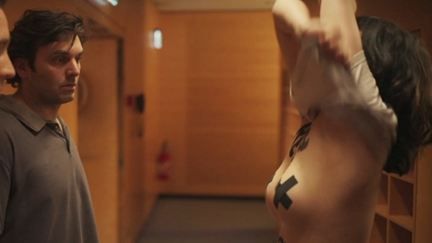 Hottest Noémie Merlant Scene in A Difficult Year. Sexy, taking off shirt, tape over breasts. 997646