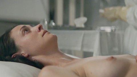 Nudes of Odet Dragi from Guardians of the Formula. Breasts, lying down, nude. 1001640