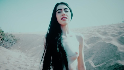Eva from Blood Pay Naked. Breasts, desert, hair over breasts. 1007897