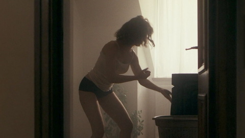 Other's Sexiest Scenes with Olga Kurylenko. Underwear, black panties, white tanktop. 1014714