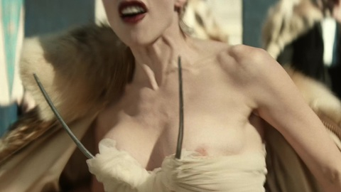 Elsie from HIM Naked. Breasts, dress, left breast. 1015577