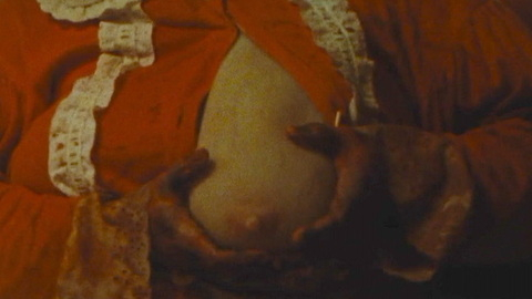 Max Lindsey Nude in Dolly. Breasts, Prosthetic, doll mask, red shirt. 1019086