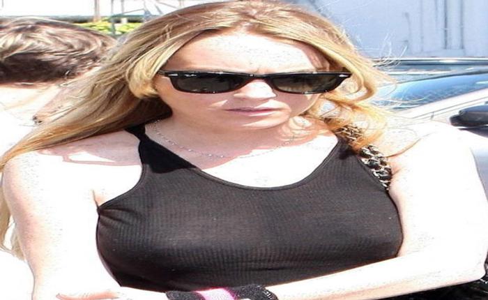 Lindsay Lohan Bobbles Her Huge Boobs Around in a See-Through Top -- in Public!