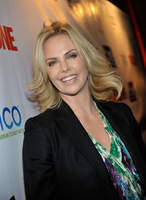 Charlize Theron Kissed a Girl . . . and WE Liked It
