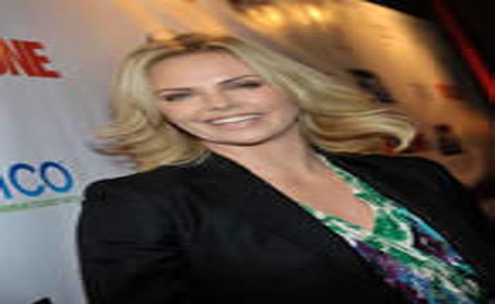 Charlize Theron Kissed a Girl . . . and WE Liked It