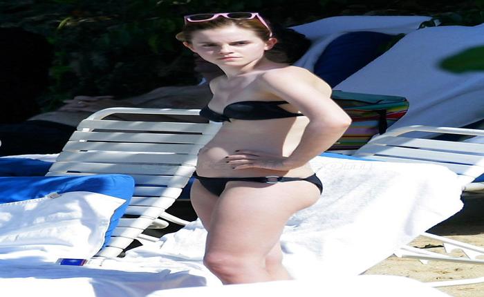 Emma Watson Magically Slips a Nipple at the Beach