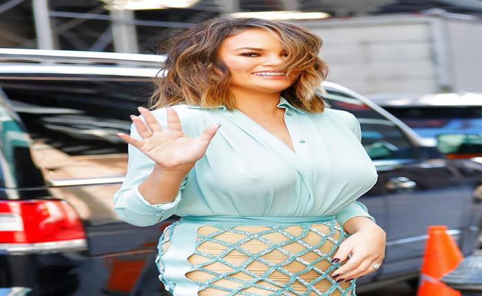 Chrissy Teigen Goes Braless... Again