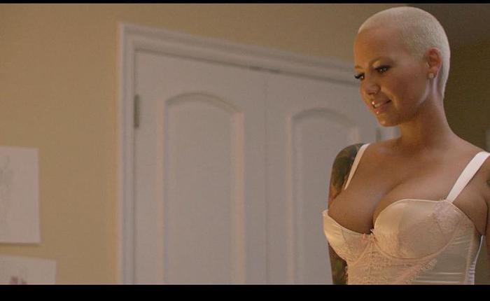 Amber Rose Shows Off Her Post Breast Reduction Cleavage