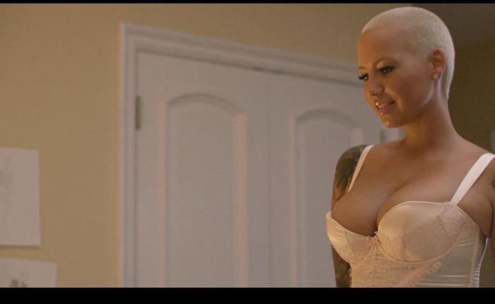 Amber Rose Shows Off Her Post Breast Reduction Cleavage