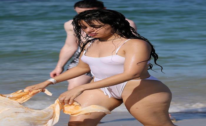 Camila Cabello Gets Wet in a See-Through White Bathing Suit 