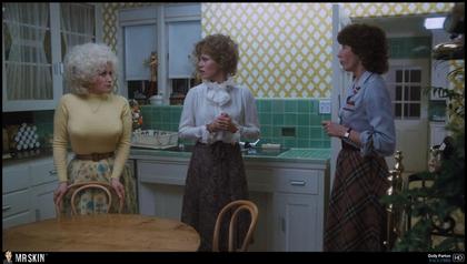 Dolly Parton poking nips